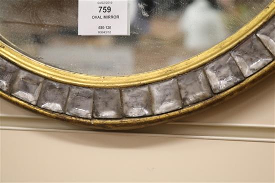 An oval Irish mirror W.47cm